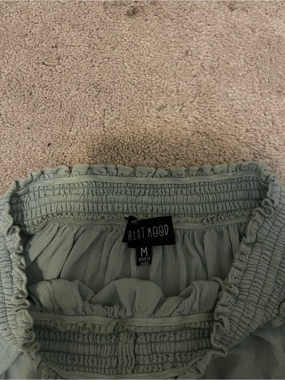 Smocked Waist Ruffle Mini Skirt in Sage - Picture 2 of 4